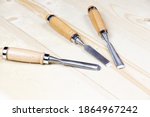 Chisels On A Wooden Background. ...