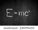 Theory of relativity. physical formula. Black school board. E mc2