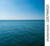 Vertical front view landscape Blue sea and sky blue background morning day look calm summer Nature tropical sea Beautiful  ocen water travel "Bangsaen Beach" East thailand Chonburi Exotic horizon.