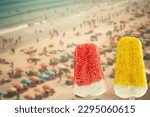 Bright fruit ice cream on a stick on a summer concept background. Frozen fruit ice. Summer mood. Cooling dessert in hot weather. Favorite delicacy for children. Homemade raspberry, strawberry, 