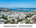 Small photo of Aerial view of the town of Papeete, Tahiti's capital, French Polynesia, with Moorea in the background.