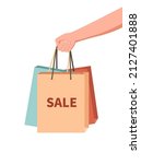 hand holding shop bag. hand... | Shutterstock .eps vector #2127401888