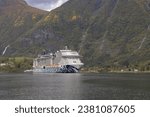 Small photo of flam, norway - 09 28 2023 scenic view of a cruise liner in a fjord in flam