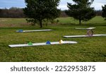 Small photo of minigolf course in park catch golf balls behind obstacle. game for points below par or above par, retirement house, senior, pay, game, tourist, beach, sand, resort, hotel, apartment, circle, meadow