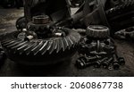 Small photo of close-up, crown gear, differential, spare parts, cogs, trucks, old, cars, being repaired, on the factory floor