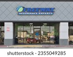 Small photo of Houston, Texas USA 08-30-2023: Freeway insurance experts building storefront exterior in Houston, TX. National business chain founded in 1987.