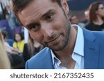 Small photo of Eurovision Song Contest in Vienna, Austria - May 17, 2015. Mons Zelmerlow from Sweden ("Heroes") on Red Carpet during the Opening Ceremony of Eurovision 2015