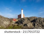 Small photo of Victoria, BC Canada - January 26, 2022: Ford Rodd Hill National Historic Site, the first light of Fisgard Lighthouse on the west coast of Canada