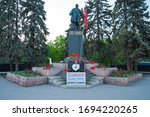 Small photo of Rostov-on-Don, Russia - April 22, 2008. Pensioner demonstrates loyalty to V. I. Lenin on his birthday. The inscription on the poster - " Socialism is the future of earthlings. Capitalism is banditry."