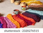 Small photo of Teotitlan del Valle is a region located 31 km from the state capital. The wool is colored using natural dyes from plants and insects such as: huizache, indigo, cochineal, indigo, rock moss, zempaxuchi