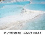 White travertines, calcite cliff of Pamukkale in Turkey. High quality photo