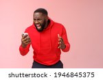 Angry furious african-american bearded guy lose control emotions shouting outraged annoyed smartphone display look phone insane stooping frowning rage, standing irritated pink background