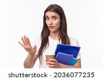 Education, university and studying concept. Wow come down, slow for minute. Close-up portrait of freaked-out shocked young female student saying stop, chill gesture, look concerned hold notebook