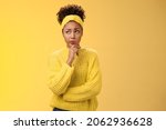 Unsure hesitant worried cute african-american girl face tough decision look up thoughtful make plan thinking how act right touch chin, make assumption standing concerned yellow background