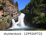 pretty cameron falls on a sunny summer day  in the town of waterton, in  alberta, canada, 