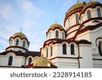 Small photo of Abkhazia, New Athos, 05.27.2020. New Athos Christian monastery. View of the domes of the monastery of St. Apostle Simon the Zealot