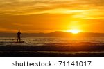 Lone Paddle Board Surfer At...