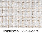 Fabric texture background with golden yarn