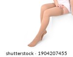Small photo of Compression Hosiery. Medical Compression stockings and tights for varicose veins and venouse therapy. Socks for man and women. Clinical compression knits. Comfort maternity tights for pregnant women.