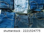 Small photo of Jeans,background jeans blue denim texture jeans background blue jeans ripped denim classic fabric natural color jeans denim fabric background with frayed holes black fabric grunge background