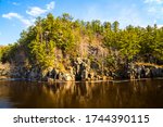 Beautiful Dalles of the St. Croix River and Interstate State Park with the rugged cliffs and pine trees in Taylors Falls, MN and St. Croix Falls, WI.