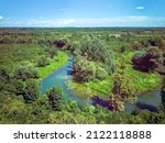 Small photo of Wild Odra river creating beautiful meandres in the ancient hunting grounds of Turopoljski Lug, Croatia, aerial perspective