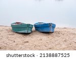 Two Old Boats On The Sandy...