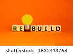 Wooden Cubes With Word 'rebuild'...