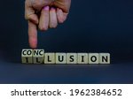 Small photo of Conclusion or illusion symbol. Businessman turns wooden cubes and changes the word 'illusion' to 'conclusion'. Beautiful grey background, copy space. Business, conclusion or illusion concept.