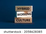 Small photo of Hybrid working culture symbol. Concept words 'hybrid working culture'. Beautiful grey background. Business and hybrid working culture concept, copy space.