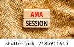 Small photo of AMA ask me anything session symbol. Concept words AMA ask me anything session on wooden blocks on a beautiful canvas background. Business and AMA ask me anything session concept. Copy space.