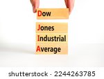 Small photo of DJIA Dow Jones industrial average symbol. Concept words DJIA Dow Jones industrial average on wooden block on beautiful white background. Business DJIA Dow Jones industrial average concept. Copy space