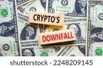 Small photo of Crypto downfall symbol. Concept words Cryptos downfall on wooden blocks. Beautiful background from dollar bills. Business and crypto downfall concept. Copy space.