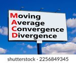 Small photo of MACD symbol. Concept words MACD moving average convergence divergence on big billboard against beautiful blue sky. Business MACD moving average convergence divergence concept. Copy space.
