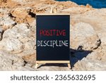 Small photo of Positive discipline symbol. Concept words Positive discipline on beautiful black chalk blackboard. Chalkboard. Beautiful sea background. Business psychology positive discipline concept. Copy space.