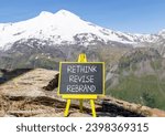 Small photo of Rethink revise rebrand symbol. Concept word Rethink Revise Rebrand on blackboard. Beautiful mountain Elbrus blue sky background. Business brand motivational rethink revise rebrand concept. Copy space