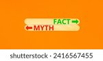 Small photo of Fact or myth symbol. Concept word Myth and Fact on beautiful wooden stick. Beautiful orange table orange background. Business and fact or myth concept. Copy space.