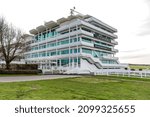 Small photo of Epsom Downs, UK - February 21, 2020 - The Queens Stand and Lester Piggott gates at Epsom Downs Racecourse.