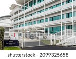 Small photo of Epsom Downs, UK - February 21, 2020 - The Queens Stand and Lester Piggott gates at Epsom Downs Racecourse. Artworks on the gates show Piggot's many Derby, Oaks and Coronation cup winners.