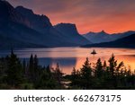 Small photo of Beautiful colorful sunset over St. Mary Lake and wild goose island in Glacier national park, Montana, USA