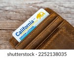 Small photo of Close-up of California driver's license.
