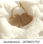 Two Burlap Hearts On White Fur...