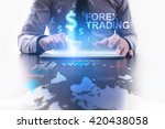 Forex trading concept. Businessman using futuristic tablet computer, pressing button on the touch screen and selecting dollar icon with FOREX TRADING text. 