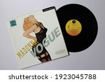 Small photo of Miami, Fl, USA: Feb 23, 2021: House dance artist, Madonna single music album on vinyl record LP disc. Titled: Vogue from the album I'm Breathless
