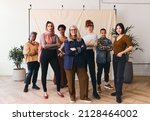 International Women's Day portrait of multi ethnic mixed age range women looking confidently towards camera, Embrace Equity