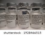 Small photo of "Darmstadt, Germany - 02.03.2021:Pfizer-BioNTech COVID-19 Vaccine "comirnaty" vials"original vaccine vial with condensation droplets arranged in a group