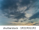 Beautiful view of sky with clouds at sunrise. Partly cloudy. Colorful sunset. Natural sky background texture, beautiful color. Sunset landscape in the sky after sunset