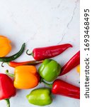 top view of peppers on white... | Shutterstock . vector #1693468495