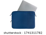 Metallic laptop inserted half-way into blue computer case with open zipper against white background