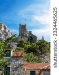 Small photo of Mirabella Pirate Fortress on top of a mountain in Omis, Croatia